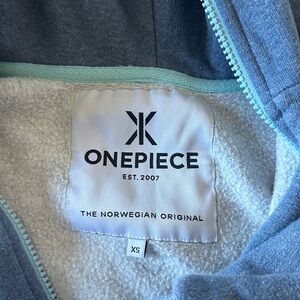 Cozy Blue Women’s Zip Up One Piece by OnePiece